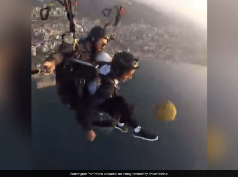 Viral video: Man juggles with football while paragliding in Lebanon