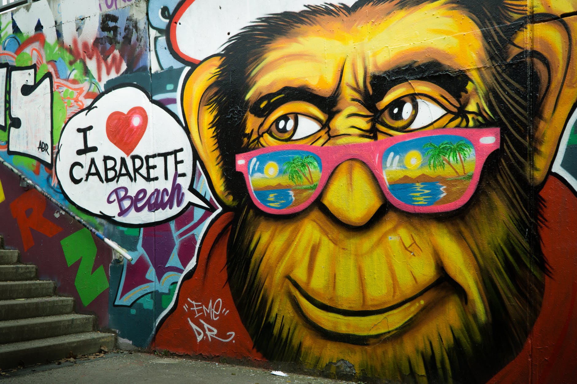 gorilla wearing pink sunglasses graffiti
